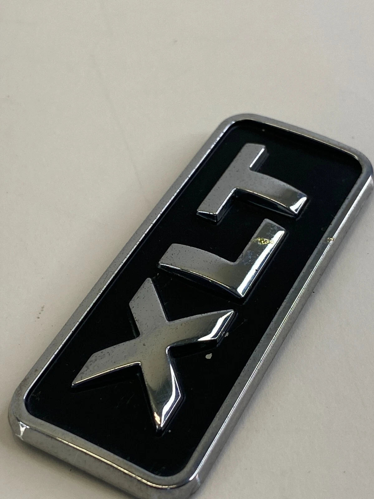 2001-2007 FORD ESCAPE REAR TRUNK EMBLEM LOGO SYMBOL XLT BADGE LIFTGATE OEM