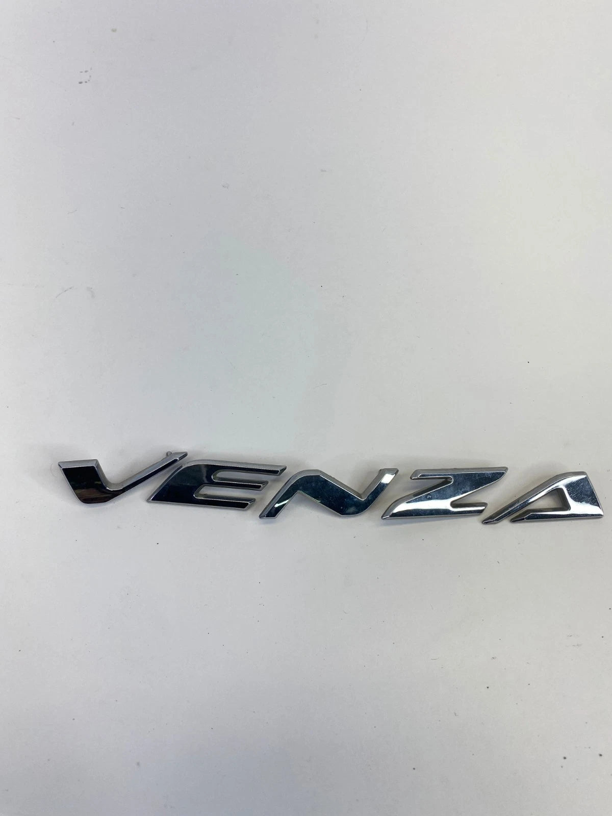 2009-2015 TOYOTA VENZA REAR LIFTGATE HATCH EMBLEM CENTER NAMEPLATE OEM FACTORY