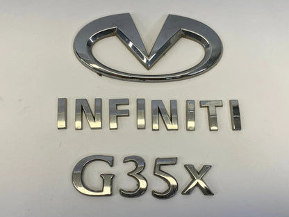 2007 2008 INFINITI G35 REAR TRUNK LID LOGO LETTERS EMBLEM SET OEM 84890JK60