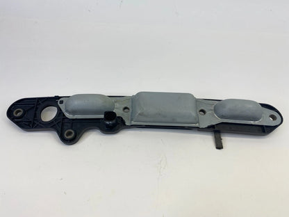 2005-2010 VOLKSWAGEN JETTA REAR LICENSE PLATE LIGHT LAMP OPENER HANDLE COVER OEM